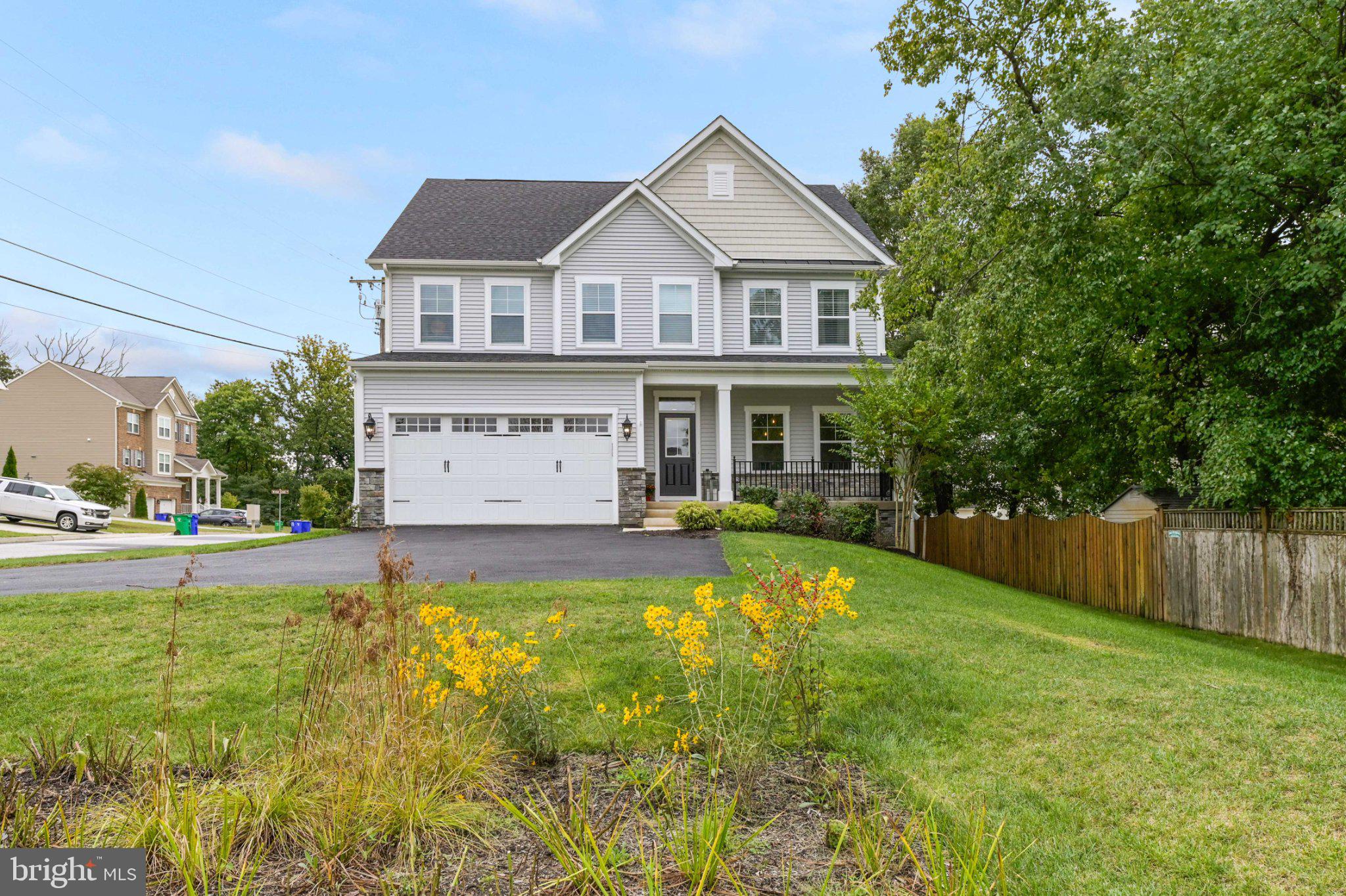 6310 Winters Lane Hanover, MD 21076 - Photo 2 of 76 a view of a house with swimming pool and a yard