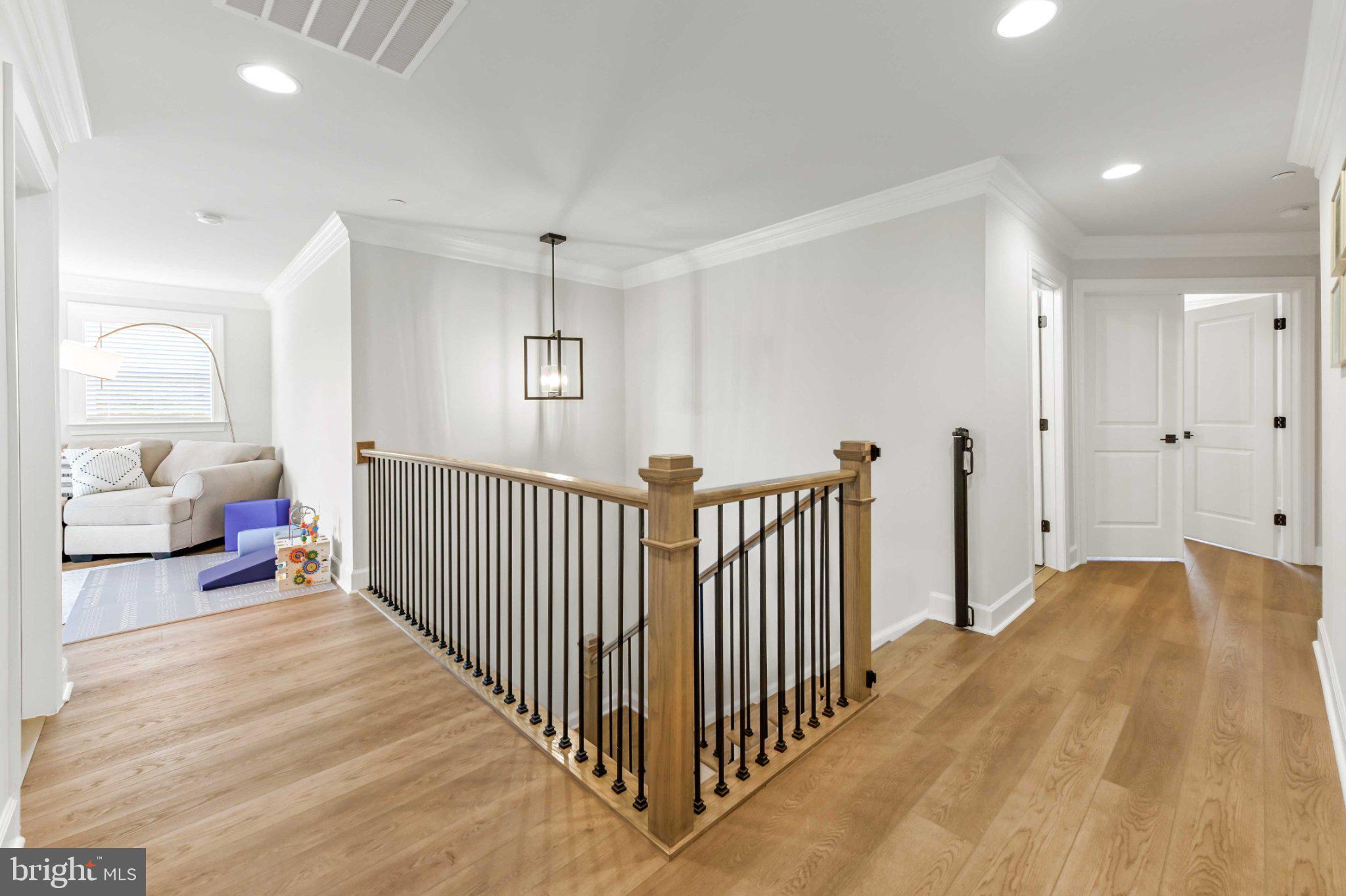 6310 Winters Lane Hanover, MD 21076 - Photo 33 of 76 a view of a bedroom with a bed and a large window