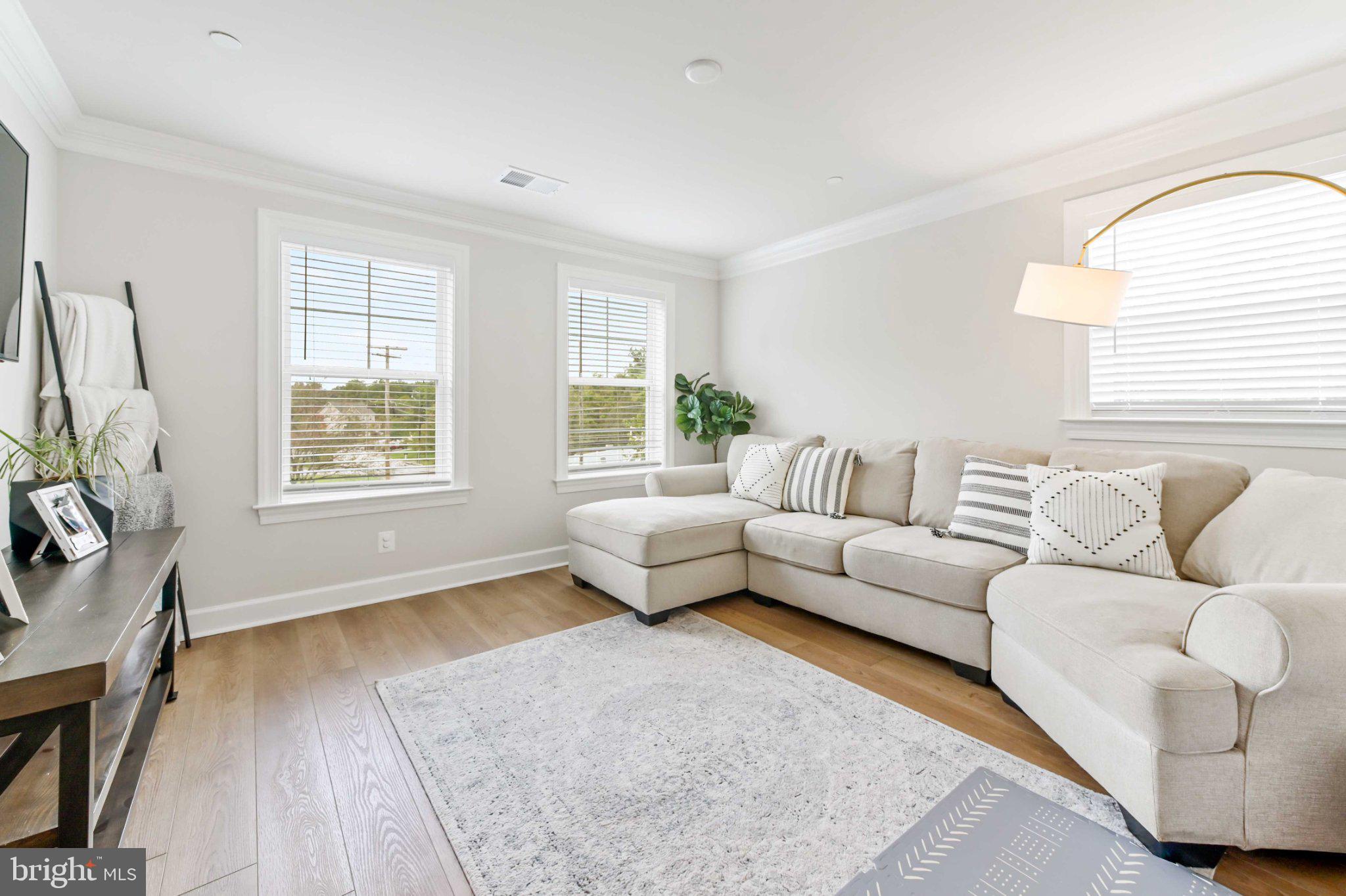 6310 Winters Lane Hanover, MD 21076 - Photo 35 of 76 a living room with furniture and a large window