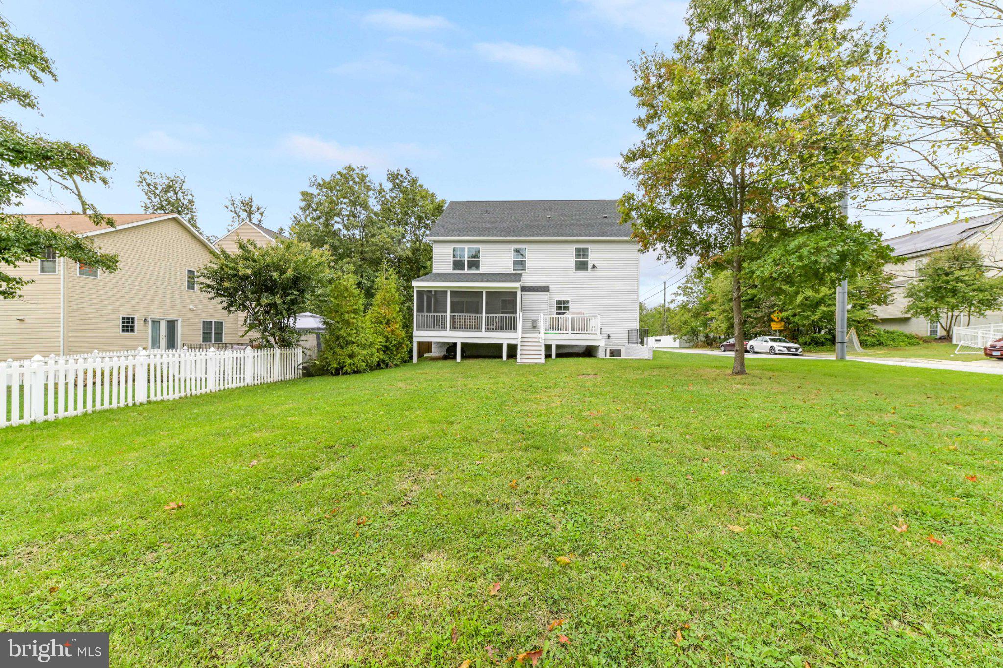 6310 Winters Lane Hanover, MD 21076 - Photo 56 of 76 a view of a house with a big yard and large trees