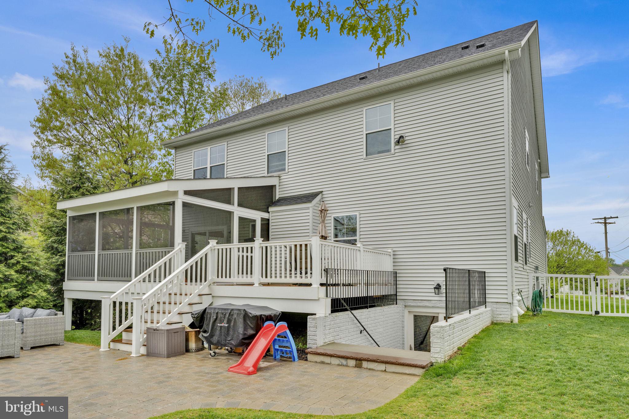 6310 Winters Lane Hanover, MD 21076 - Photo 72 of 76 a view of house with backyard space and balcony