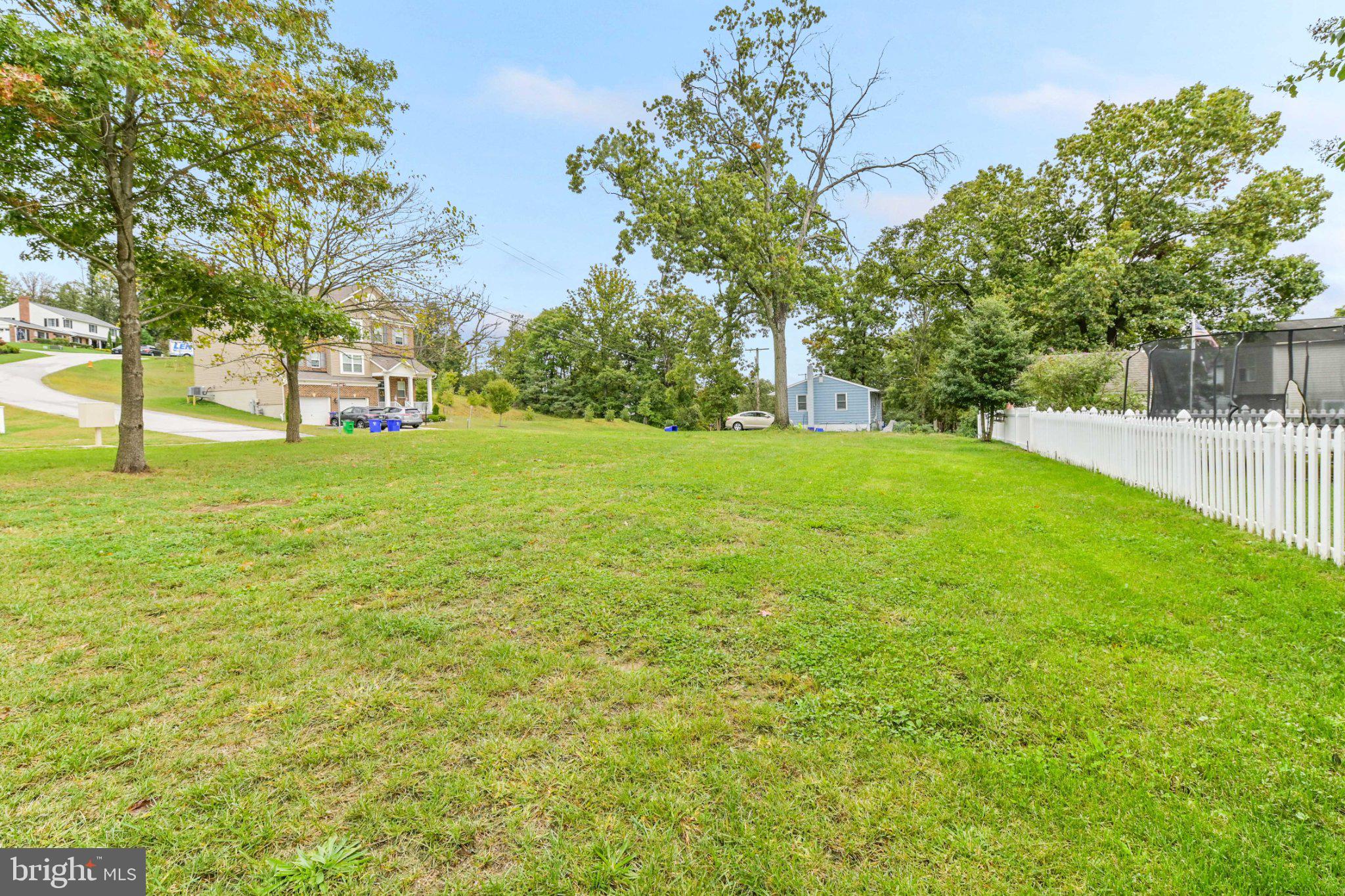 6310 Winters Lane Hanover, MD 21076 - Photo 74 of 76 a swimming pool with an outdoor space and seating area