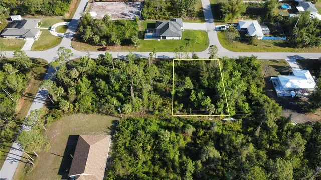 an aerial view of residential house with outdoor space