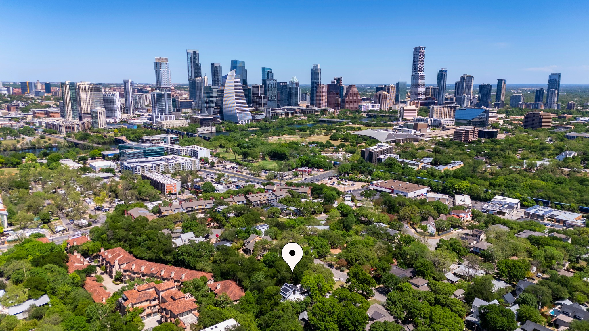 700 Jessie Street Austin, TX 78704 - Photo 36 of 40 Bird's eye view of city skyline and a tree filled landscape