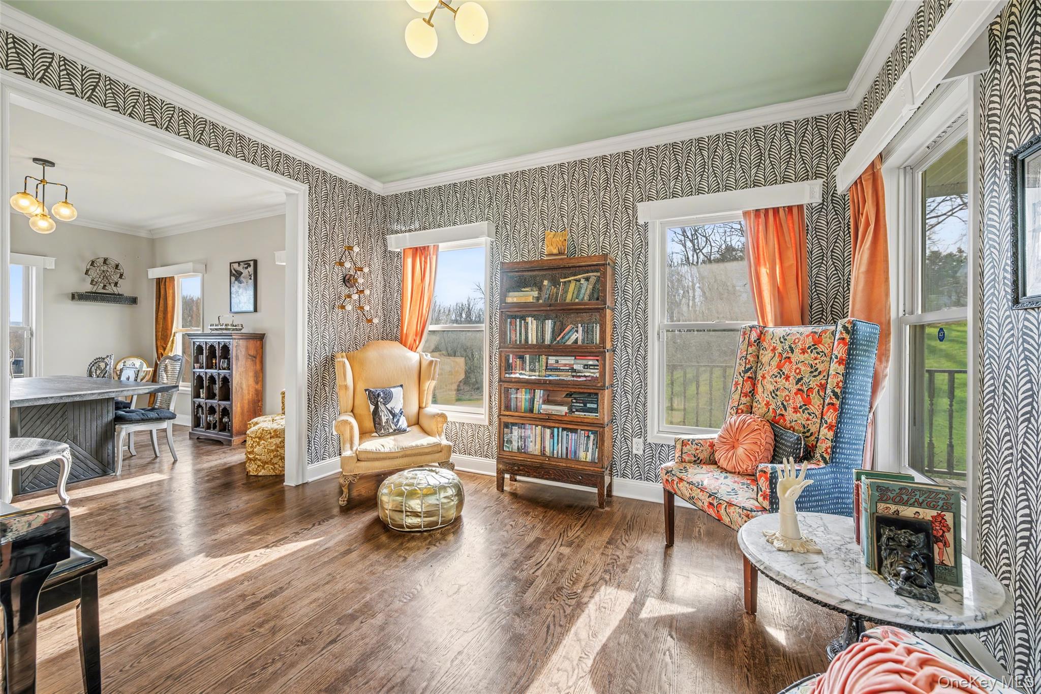 67 Liberty Corners Road Pine Island, NY 10969 - Photo 16 of 42 a living room with furniture and a large window