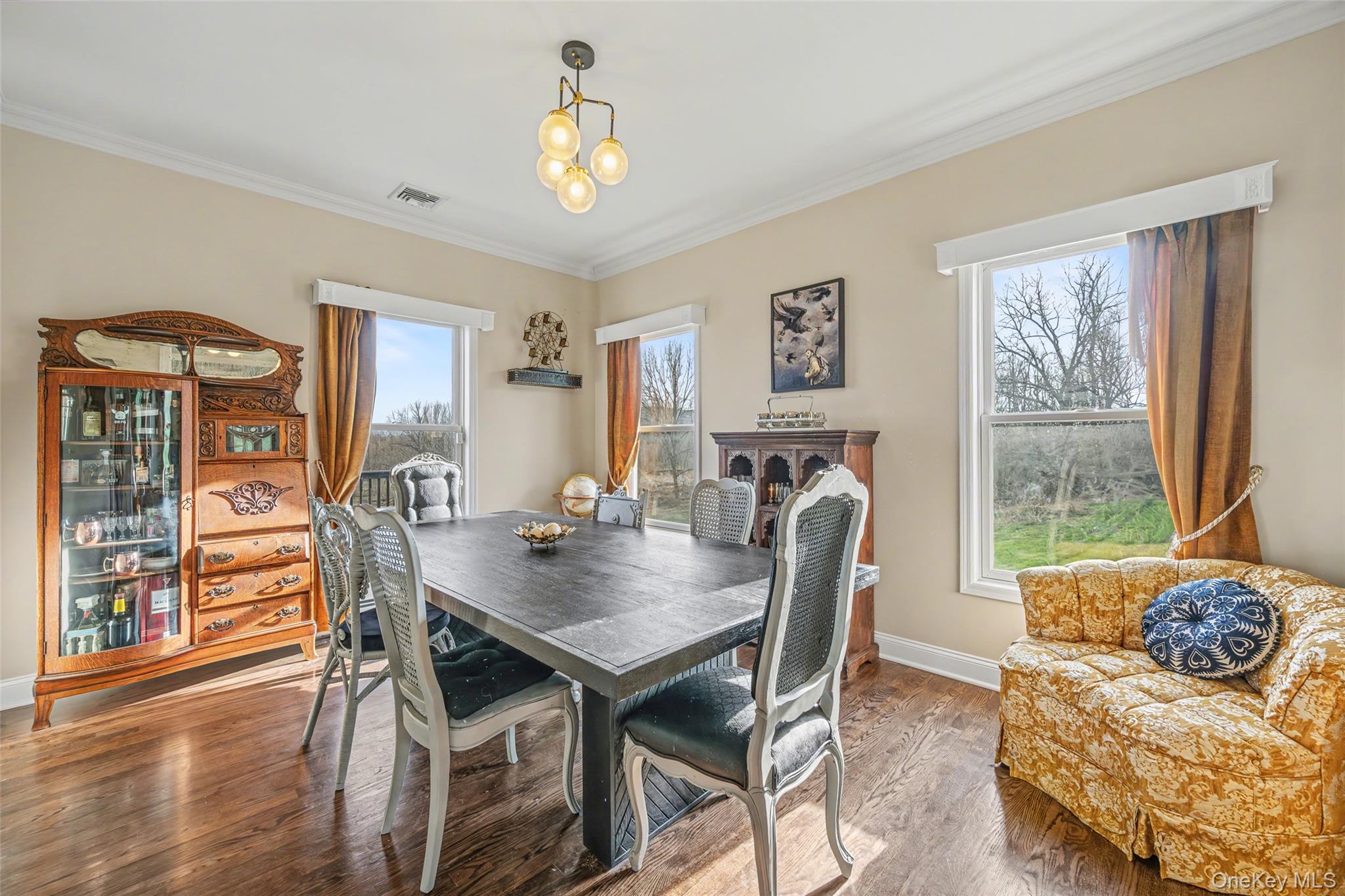 67 Liberty Corners Road Pine Island, NY 10969 - Photo 17 of 42 a view of a dining room with furniture and wooden floor