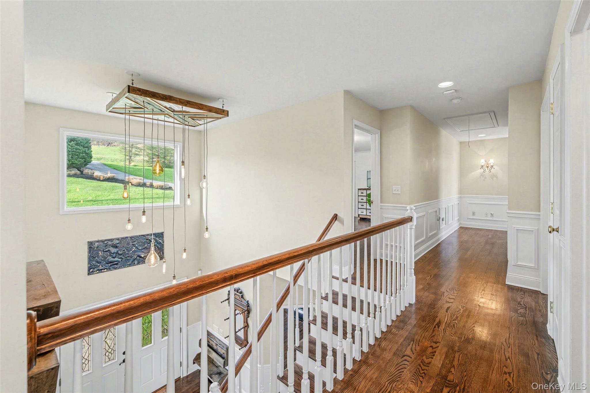 67 Liberty Corners Road Pine Island, NY 10969 - Photo 21 of 42 a view of a hallway with wooden floor and windows