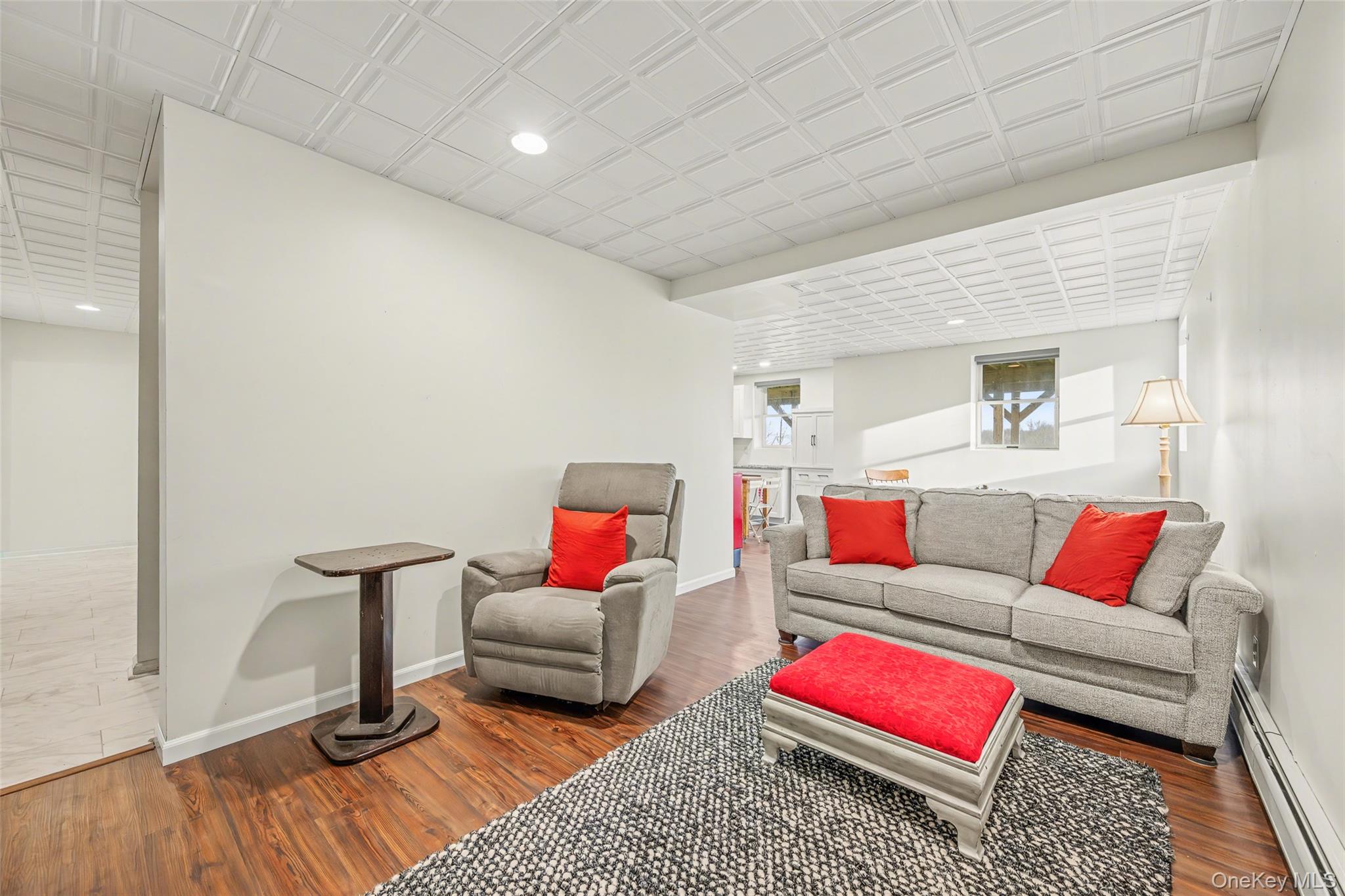 67 Liberty Corners Road Pine Island, NY 10969 - Photo 31 of 42 a living room with furniture and a wooden floor