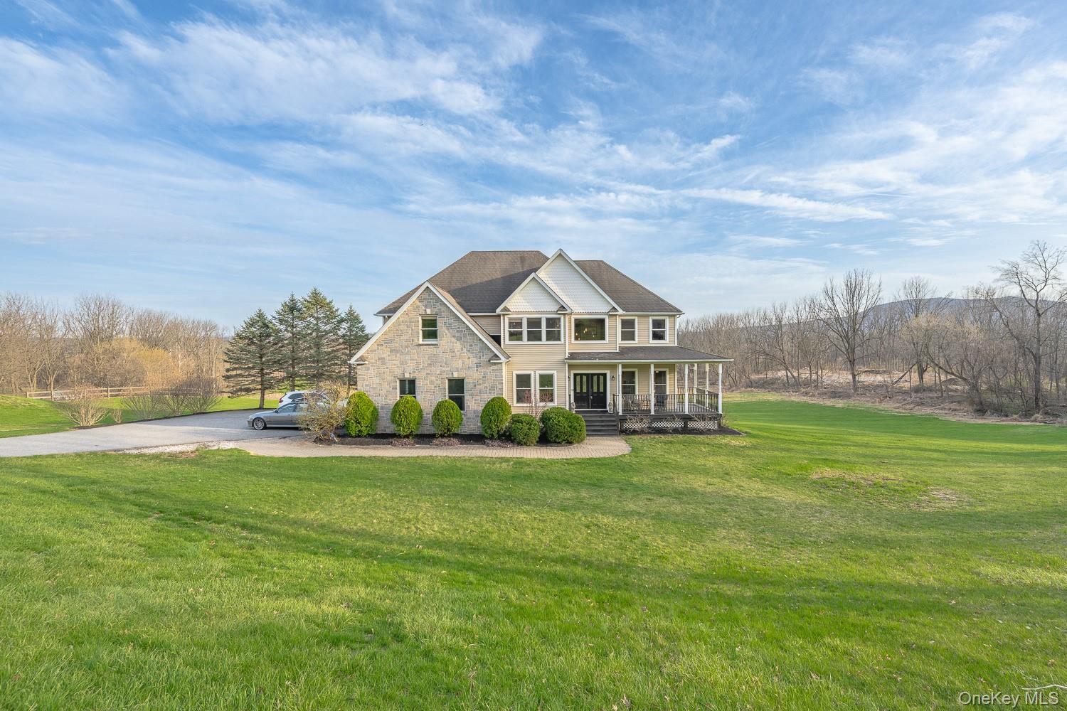 67 Liberty Corners Road Pine Island, NY 10969 - Photo 34 of 42 a view of a big house with a big yard and large trees