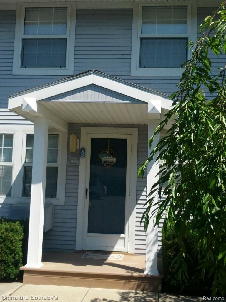 13456 Stover Road, Unit 3 Charlevoix, MI 49720 - Photo 1 of 16 Private front entrance.