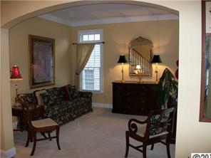 3336 Rhett Butler Place Charlotte, NC 28270 - Photo 3 of 16 a living room with furniture and a window