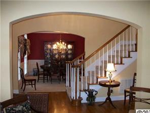 3336 Rhett Butler Place Charlotte, NC 28270 - Photo 5 of 16 a view of entryway livingroom and hall with wooden floor