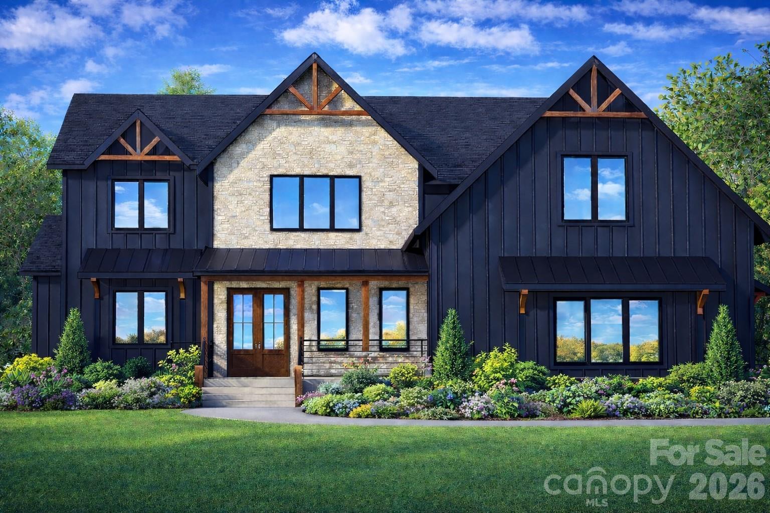 25 Emory Paige Road Weaverville, NC 28787 - Photo 3 of 20 a front view of a house with a yard