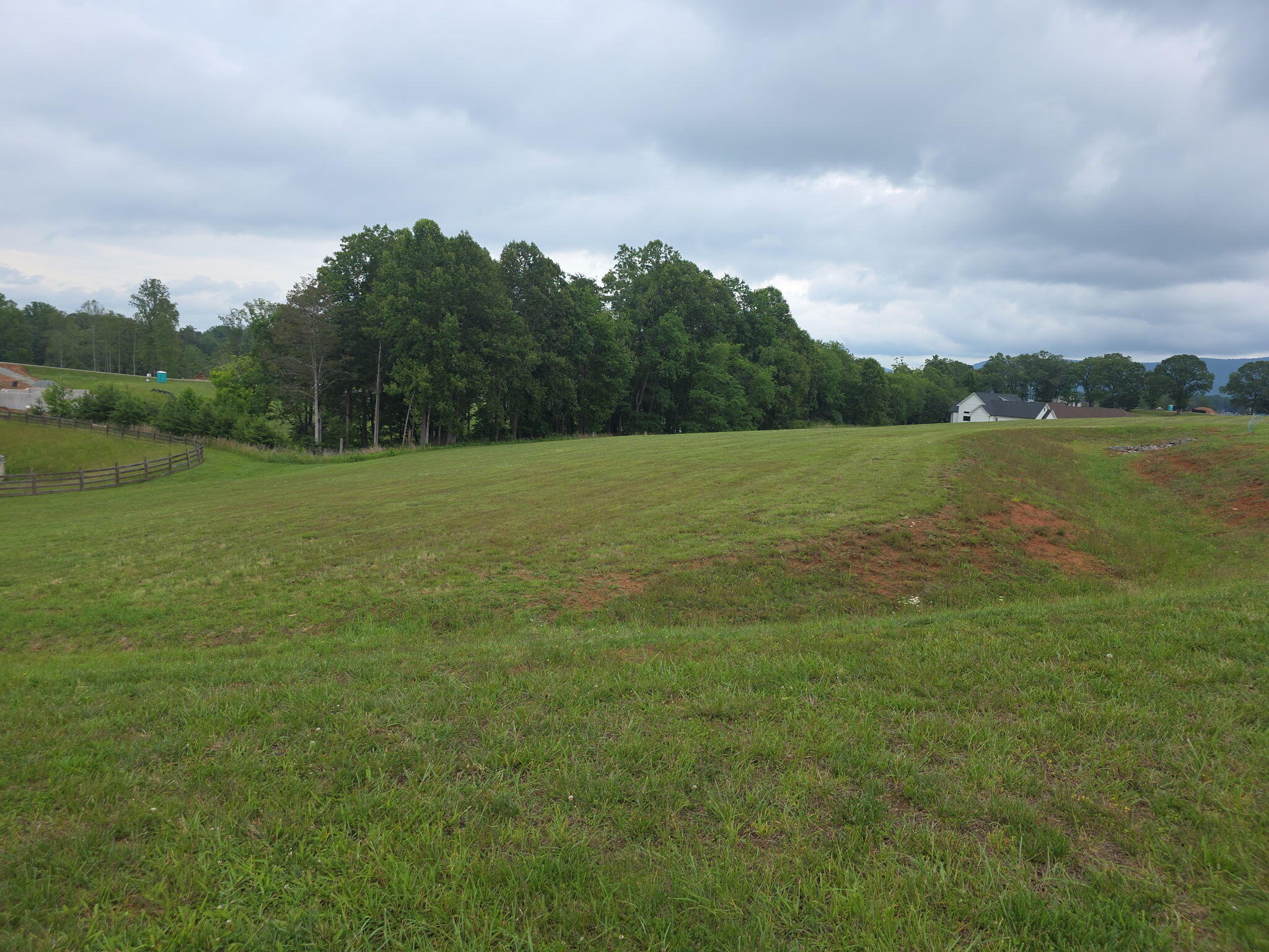 81 Hyannis Point Union Hall, VA 24176 - Photo 5 of 6 a view of a field with an ocean and trees in the background