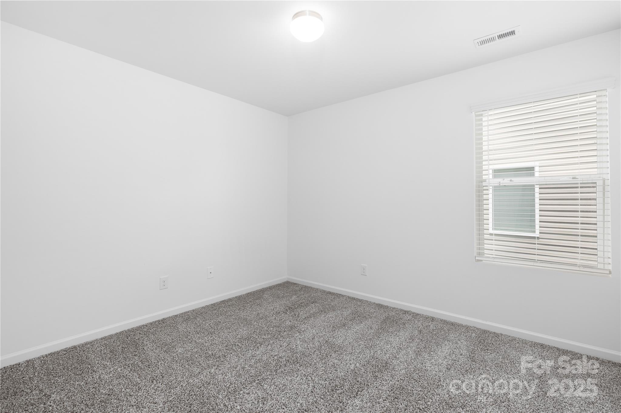 12536 Gotland Road, Unit 330 Midland, NC 28107 - Photo 22 of 28 an empty room with a window