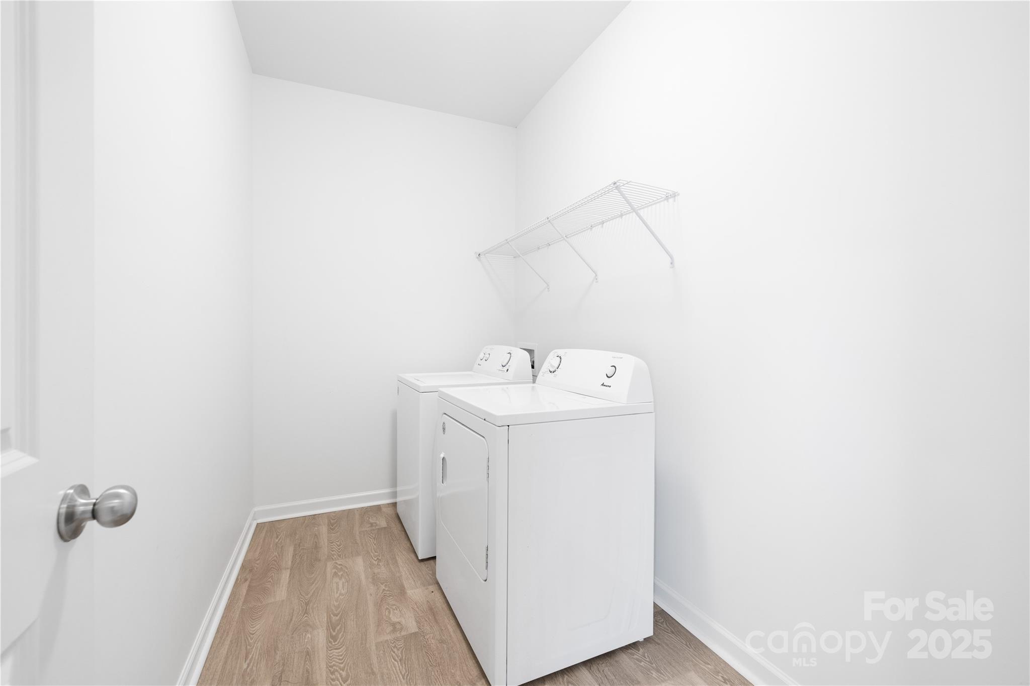 12536 Gotland Road, Unit 330 Midland, NC 28107 - Photo 27 of 28 a utility room with a sink dryer and washer