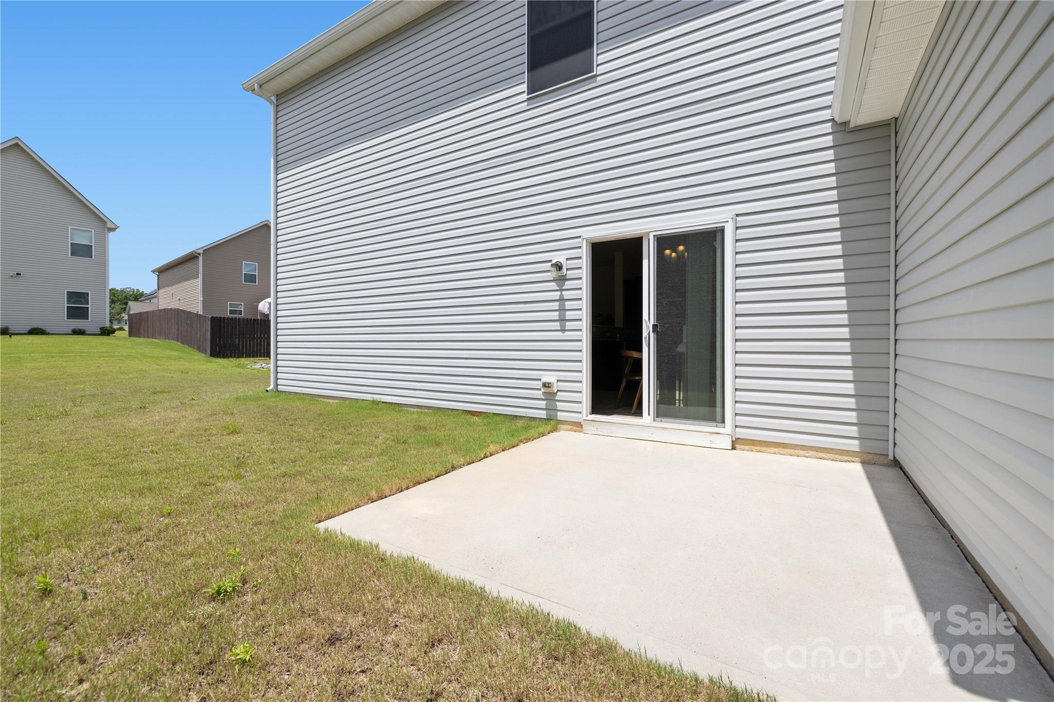 12536 Gotland Road, Unit 330 Midland, NC 28107 - Photo 28 of 28 a view of a backyard of the house