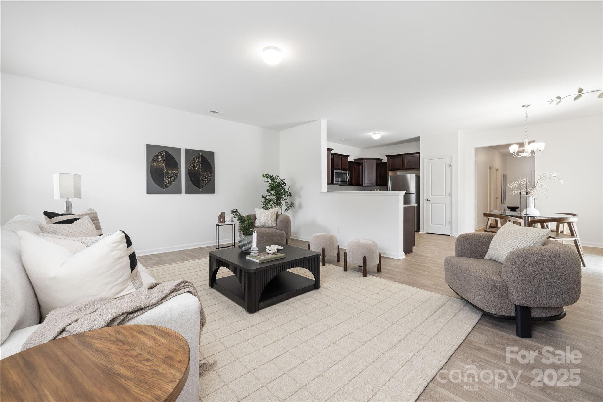 12536 Gotland Road, Unit 330 Midland, NC 28107 - Photo 7 of 28 a living room with furniture and a flat screen tv