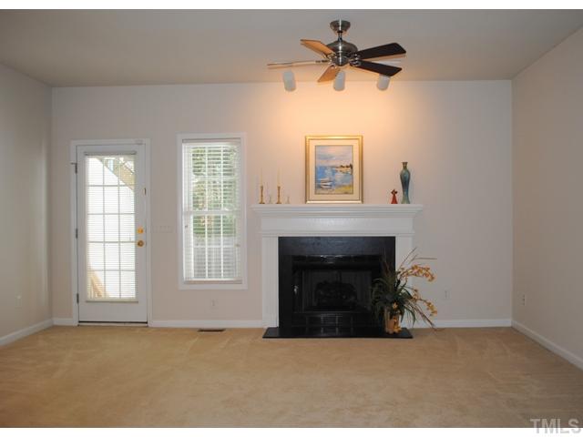 2503 Trout Stream Drive Raleigh, NC 27604 - Photo 4 of 10 Spacious Family Room complete with gas log fireplace. Door leadsoutside to backyard and extra storage