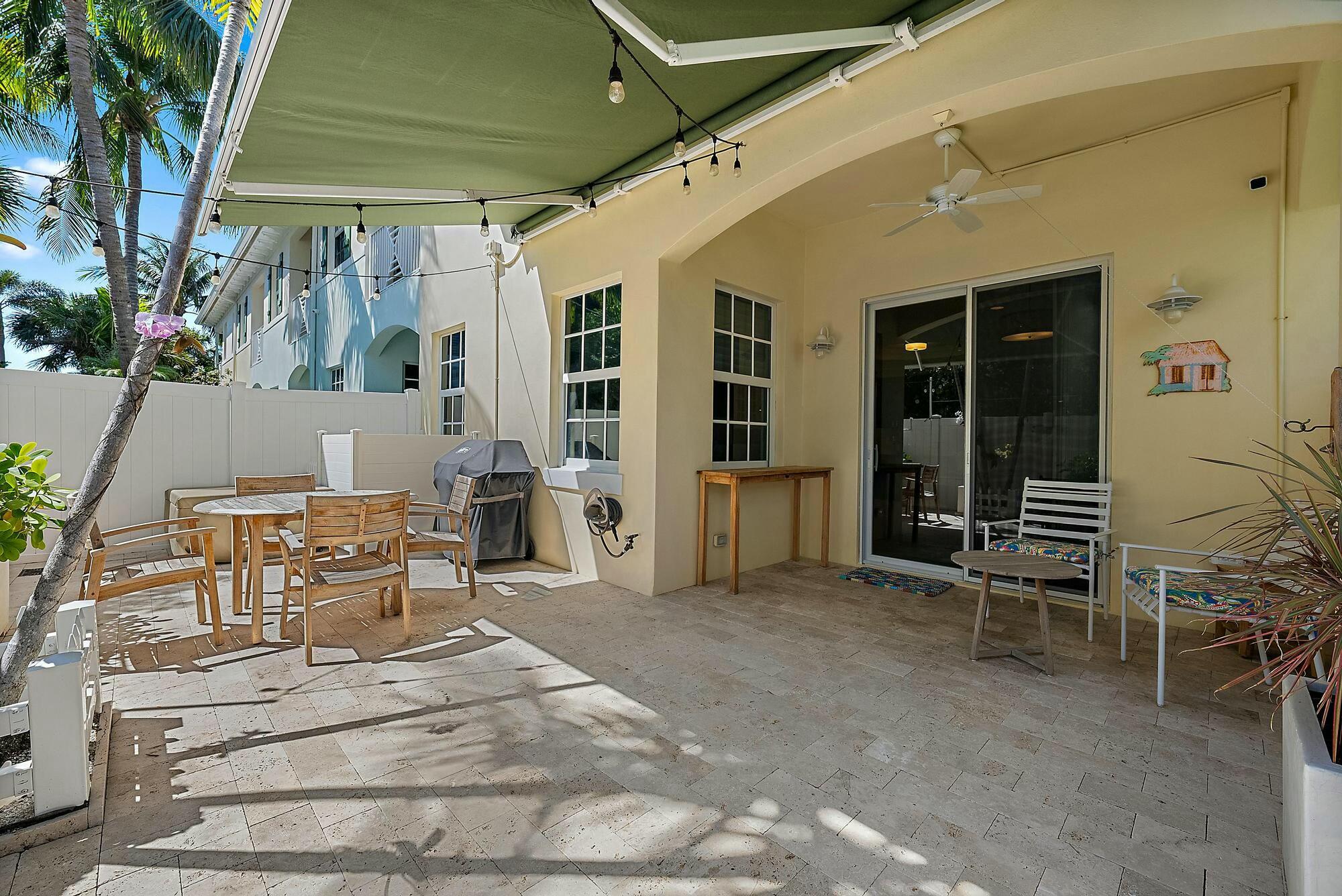 461 Ocean Ridge Way Juno Beach, FL 33408 - Photo 22 of 30 Patio with awning