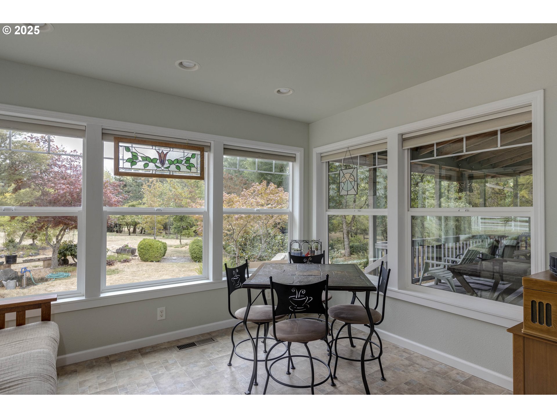 8205 Southwest Broadmead Road Amity, OR 97101 - Photo 14 of 30 a dining room with furniture and large windows