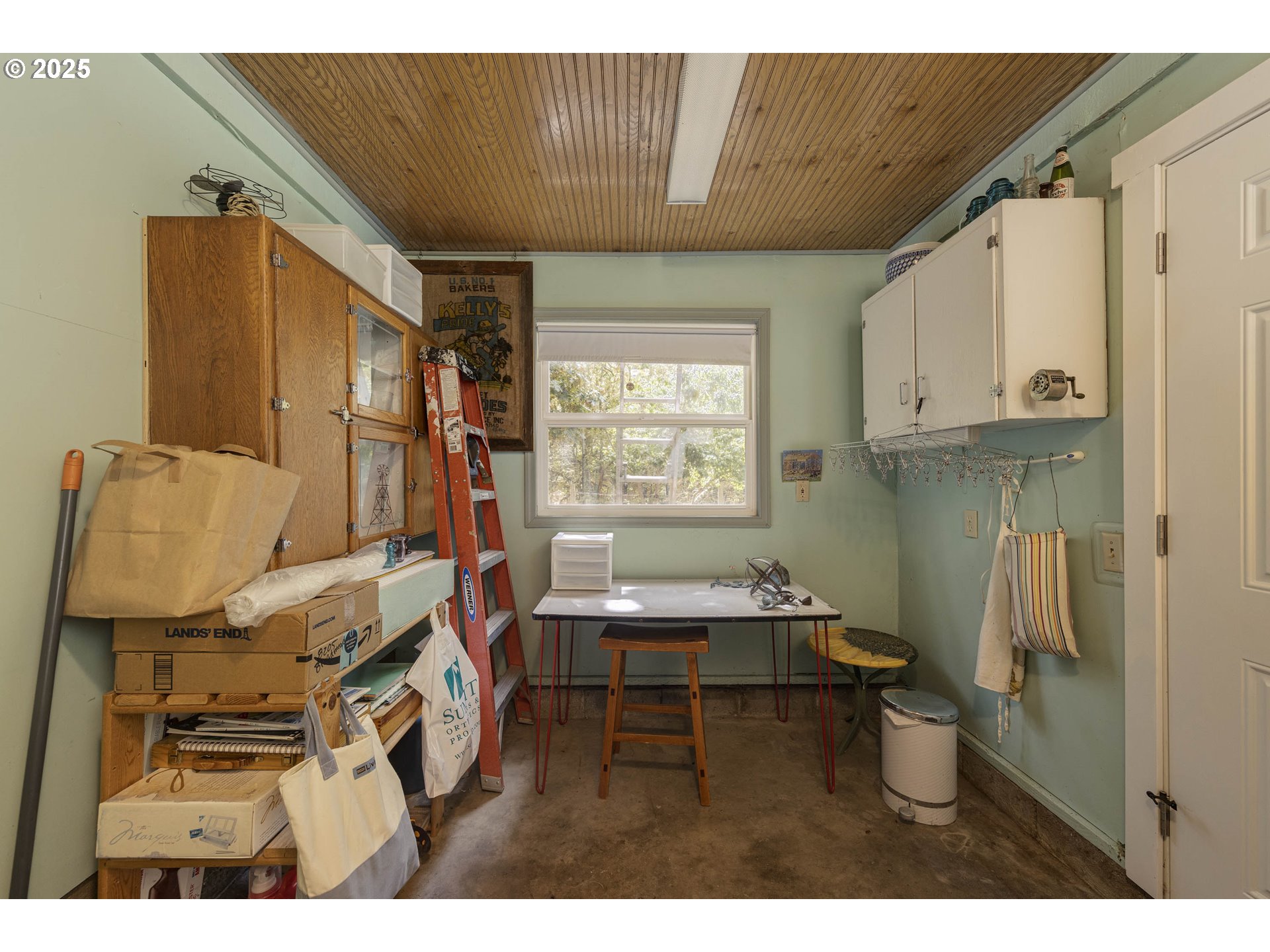 8205 Southwest Broadmead Road Amity, OR 97101 - Photo 20 of 30 a living room with furniture and a window
