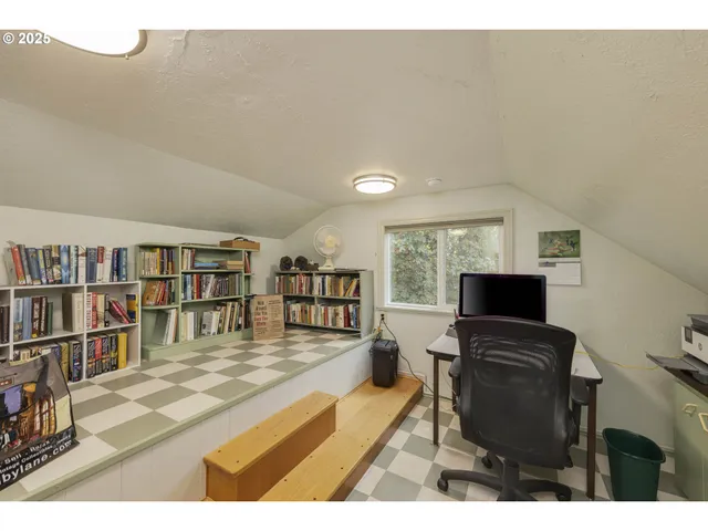 a living room with lots of furniture and a flat screen tv