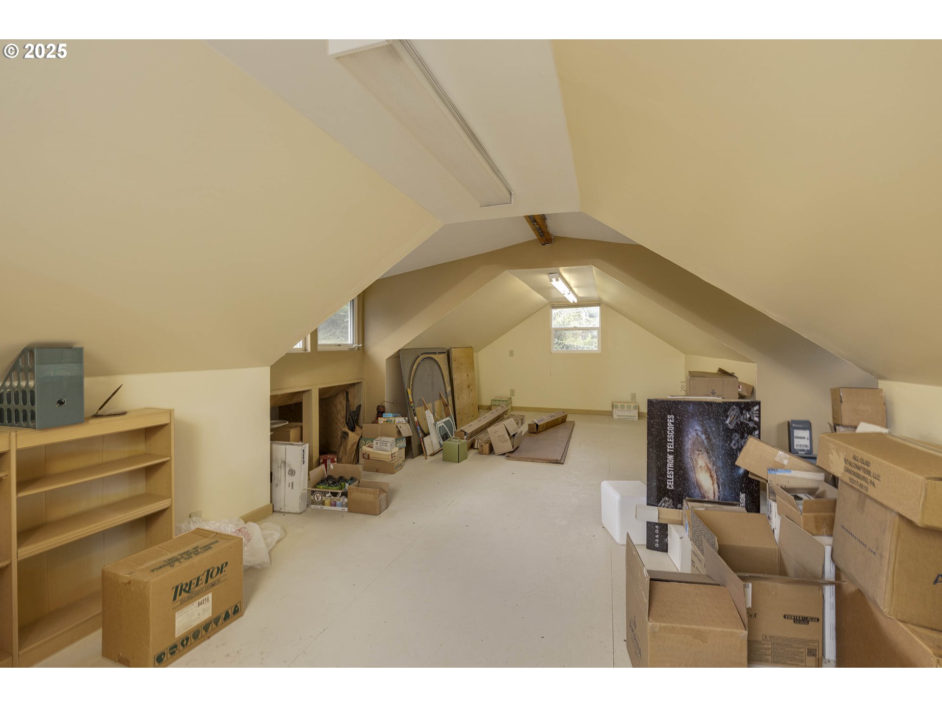 8205 Southwest Broadmead Road Amity, OR 97101 - Photo 26 of 30 a view of a livingroom with furniture and a ceiling fan