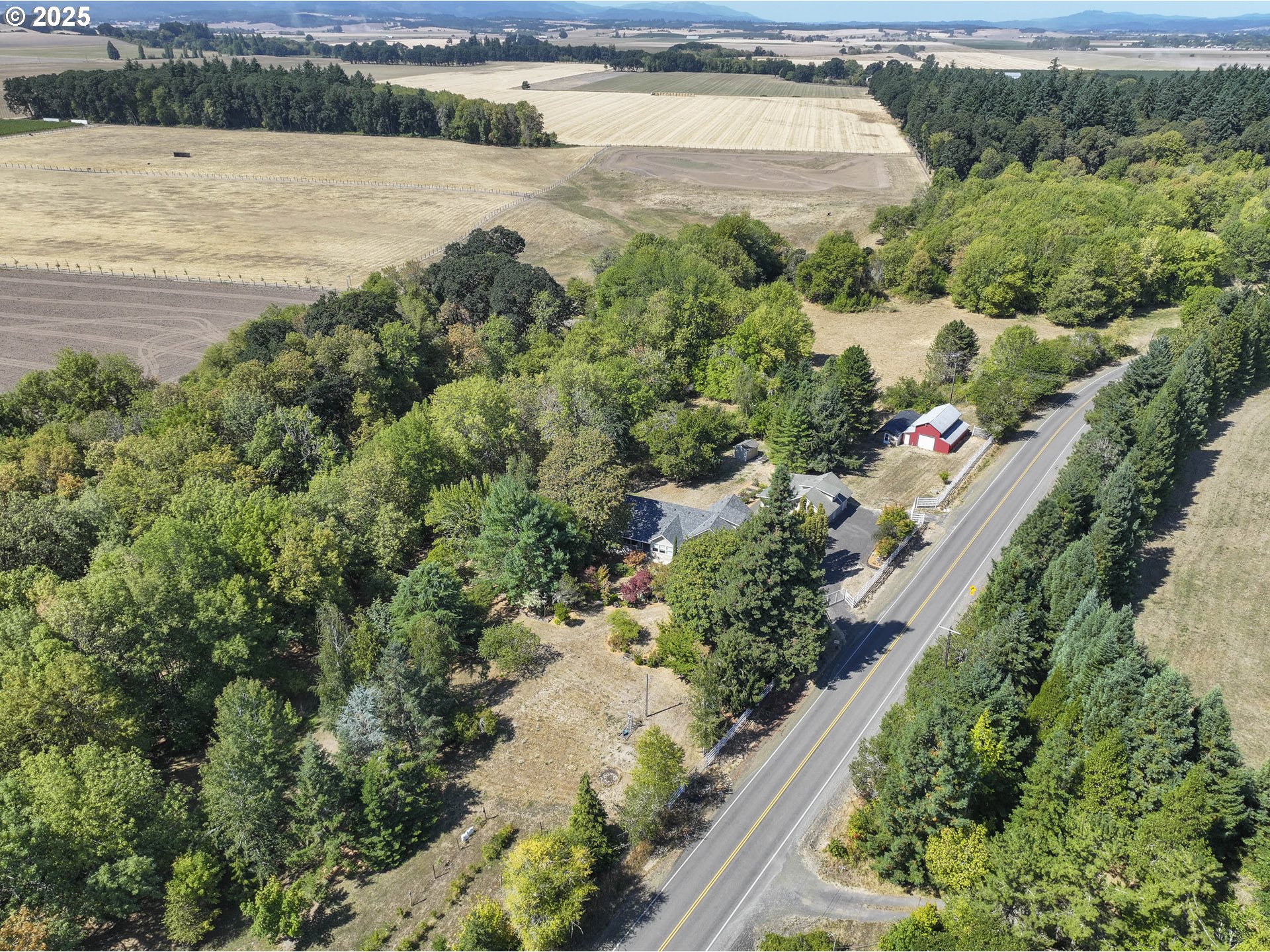 8205 Southwest Broadmead Road Amity, OR 97101 - Photo 27 of 30 a view of a lake with a house