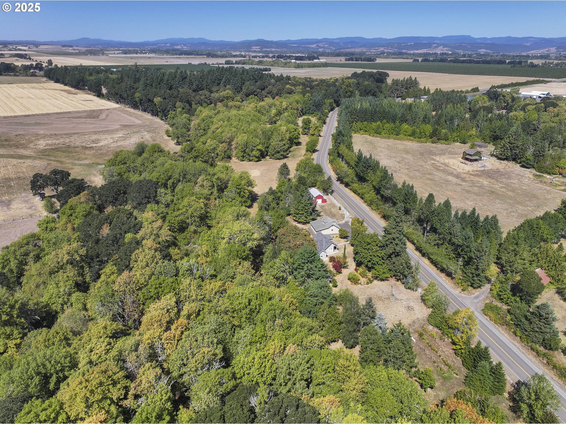 8205 Southwest Broadmead Road Amity, OR 97101 - Photo 28 of 30 a view of a city with mountains in the background
