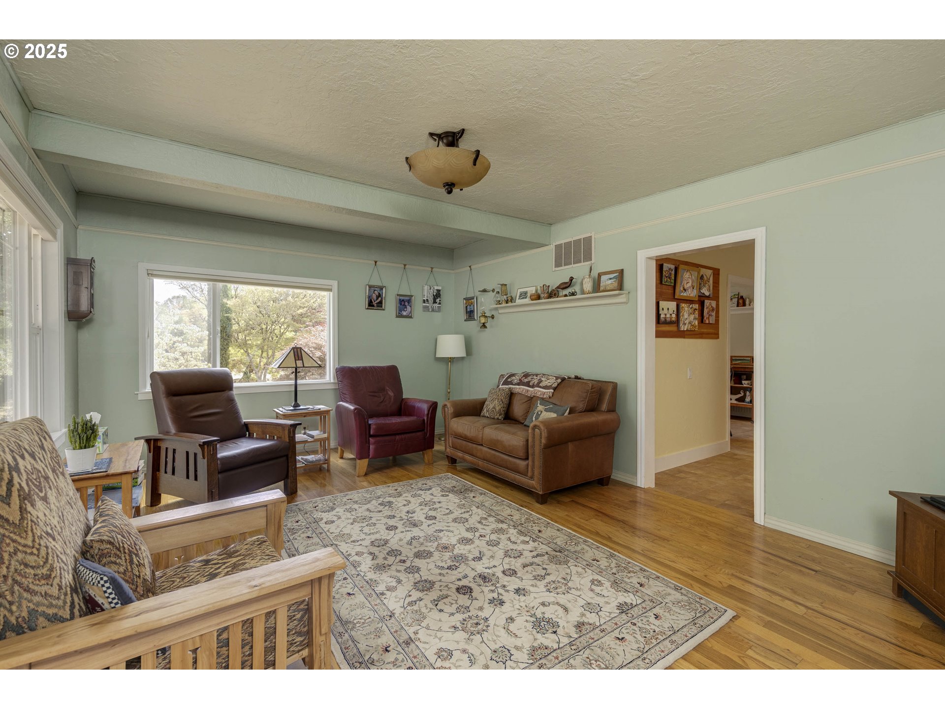 8205 Southwest Broadmead Road Amity, OR 97101 - Photo 7 of 30 a living room with furniture and a window