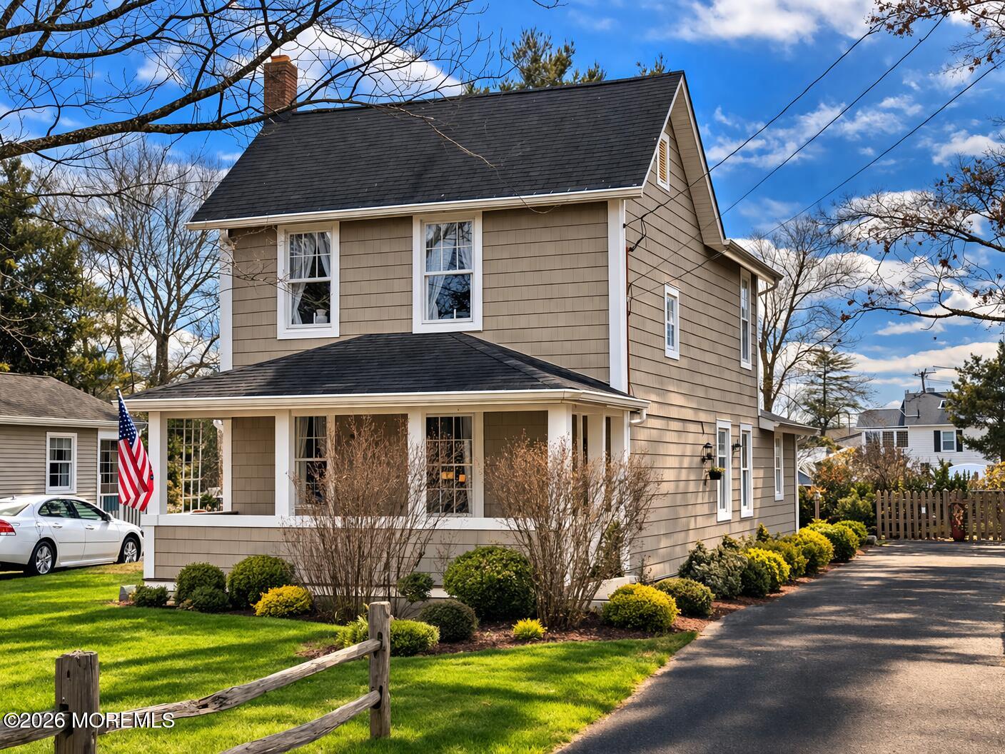 214 Howe Street Point Pleasant, NJ 08742 - Photo 1 of 16 a front view of a house with a yard