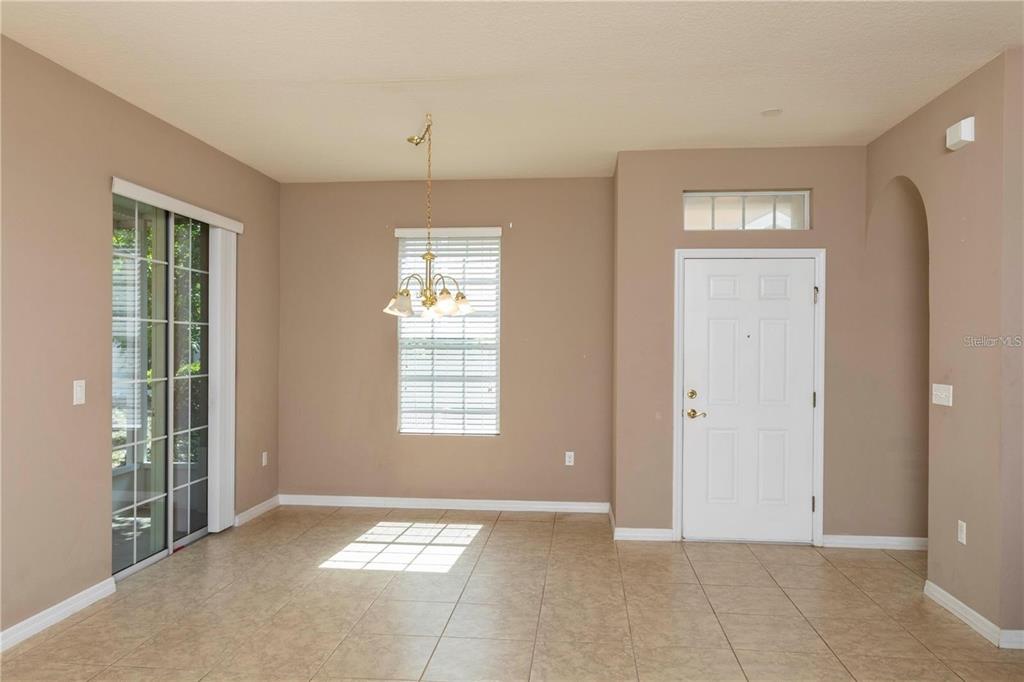 8409 Blue Rock Drive New Port Richey, FL 34653 - Photo 16 of 36 an empty room with windows