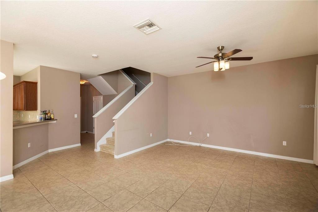 8409 Blue Rock Drive New Port Richey, FL 34653 - Photo 8 of 36 a view of an empty room with a window