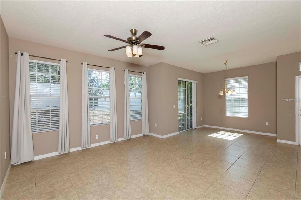 8409 Blue Rock Drive New Port Richey, FL 34653 - Photo 10 of 36 a view of an empty room with a window