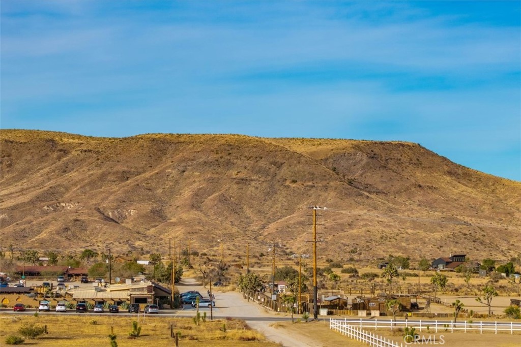 59 Curtis Road Pioneertown, CA 92268 - Photo 14 of 16 an aerial view of residential houses with outdoor space