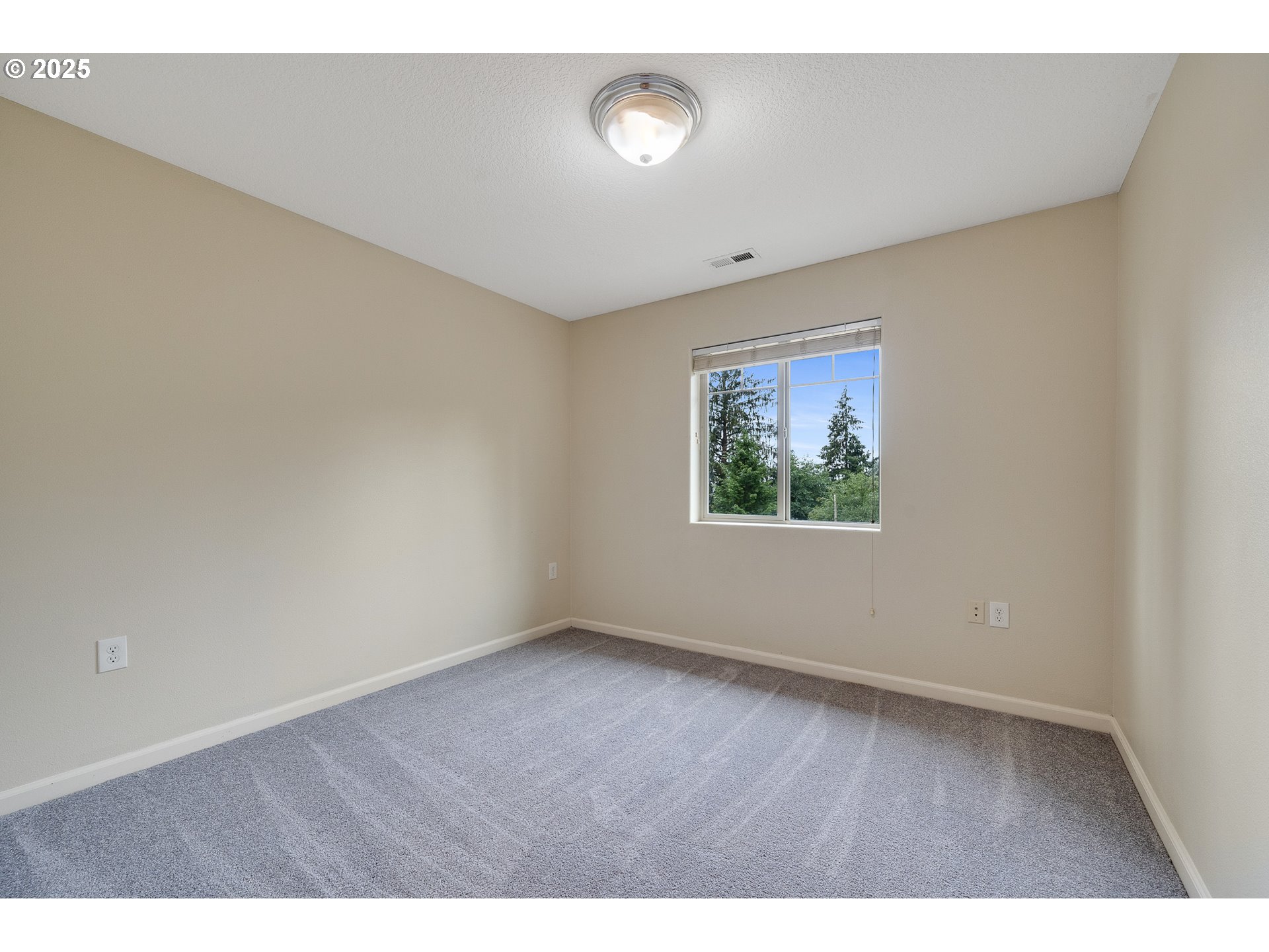 3355 Hubert Road Tillamook, OR 97141 - Photo 18 of 35 a view of an empty room with a window