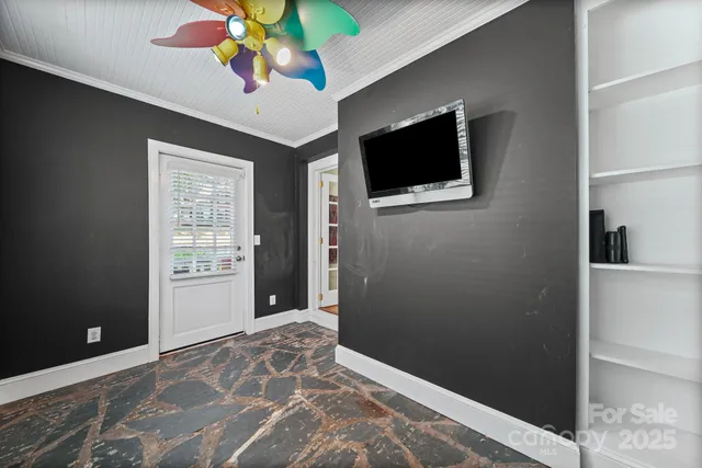 a view of a livingroom with a flat screen tv