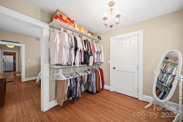 a view of an entryway with wooden floor