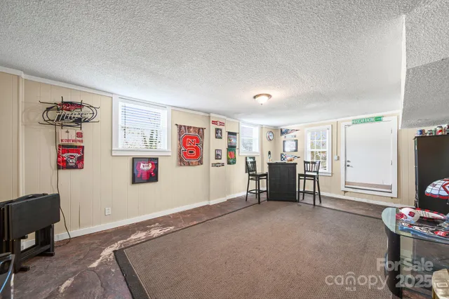 a bed room with furniture and a window