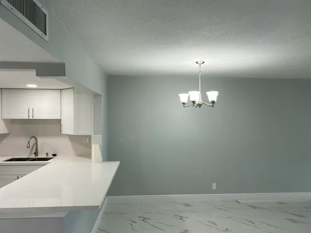 $249,900 | 2788 Tennis Club Drive, Unit 102, West Palm Beach, FL 33417