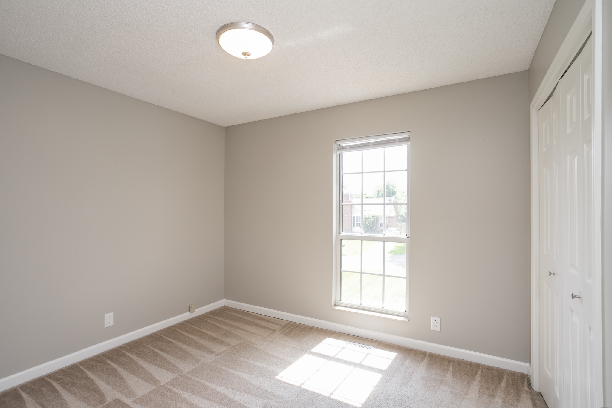 1609 Robards Way Hermitage, TN 37076 - Photo 18 of 43 an empty room with windows