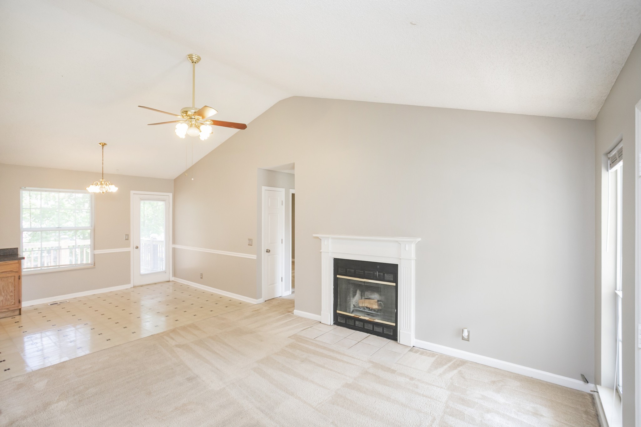 1609 Robards Way Hermitage, TN 37076 - Photo 3 of 43 an empty room with windows and fireplace