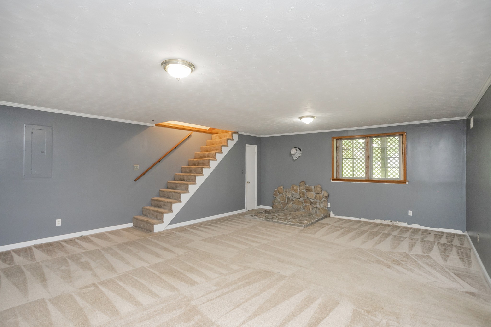1609 Robards Way Hermitage, TN 37076 - Photo 33 of 43 a view of an empty room with staircase and wooden floor