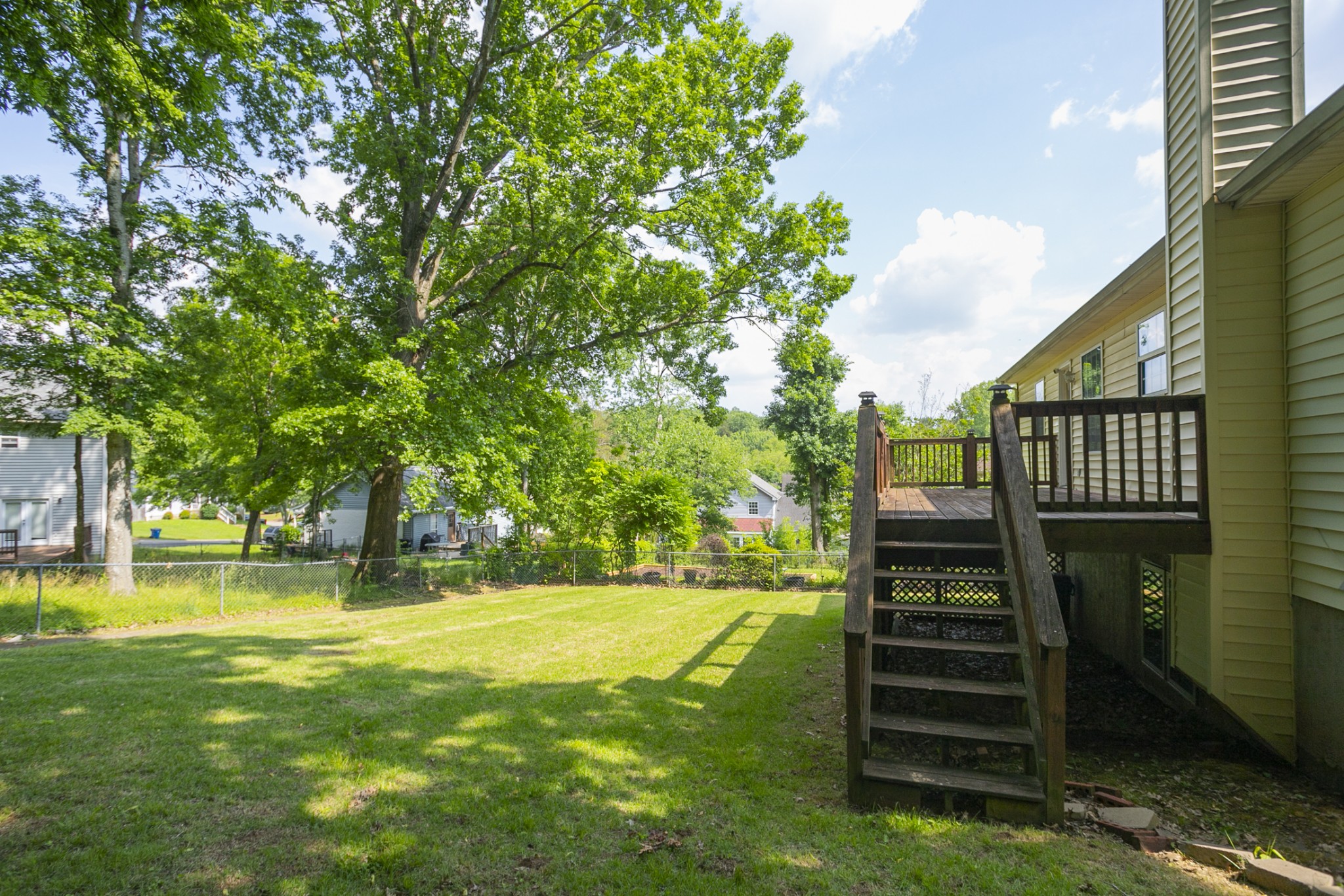 1609 Robards Way Hermitage, TN 37076 - Photo 39 of 43 a view of a swimming pool with a garden and trees