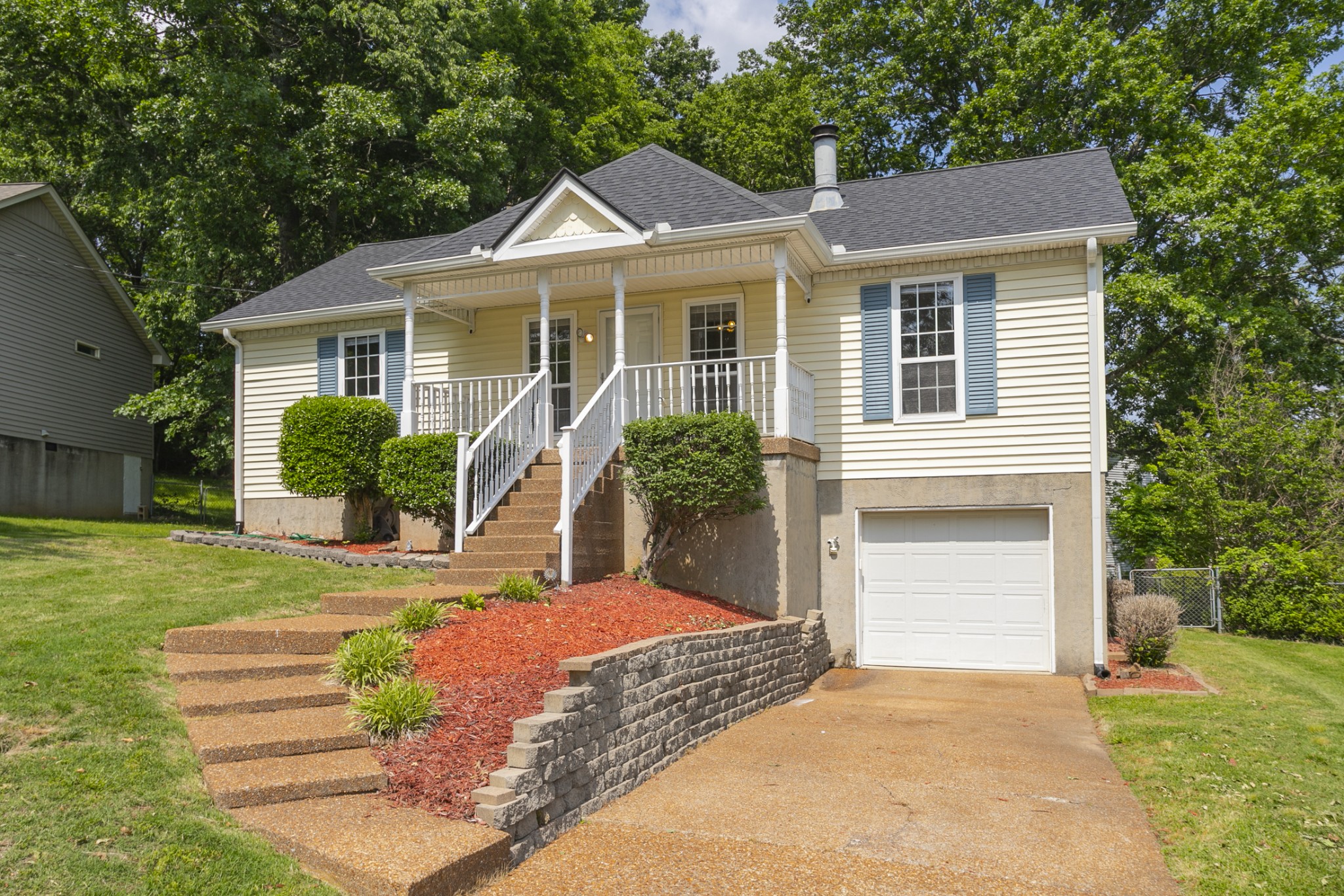 1609 Robards Way Hermitage, TN 37076 - Photo 5 of 43 a front view of a house with garden