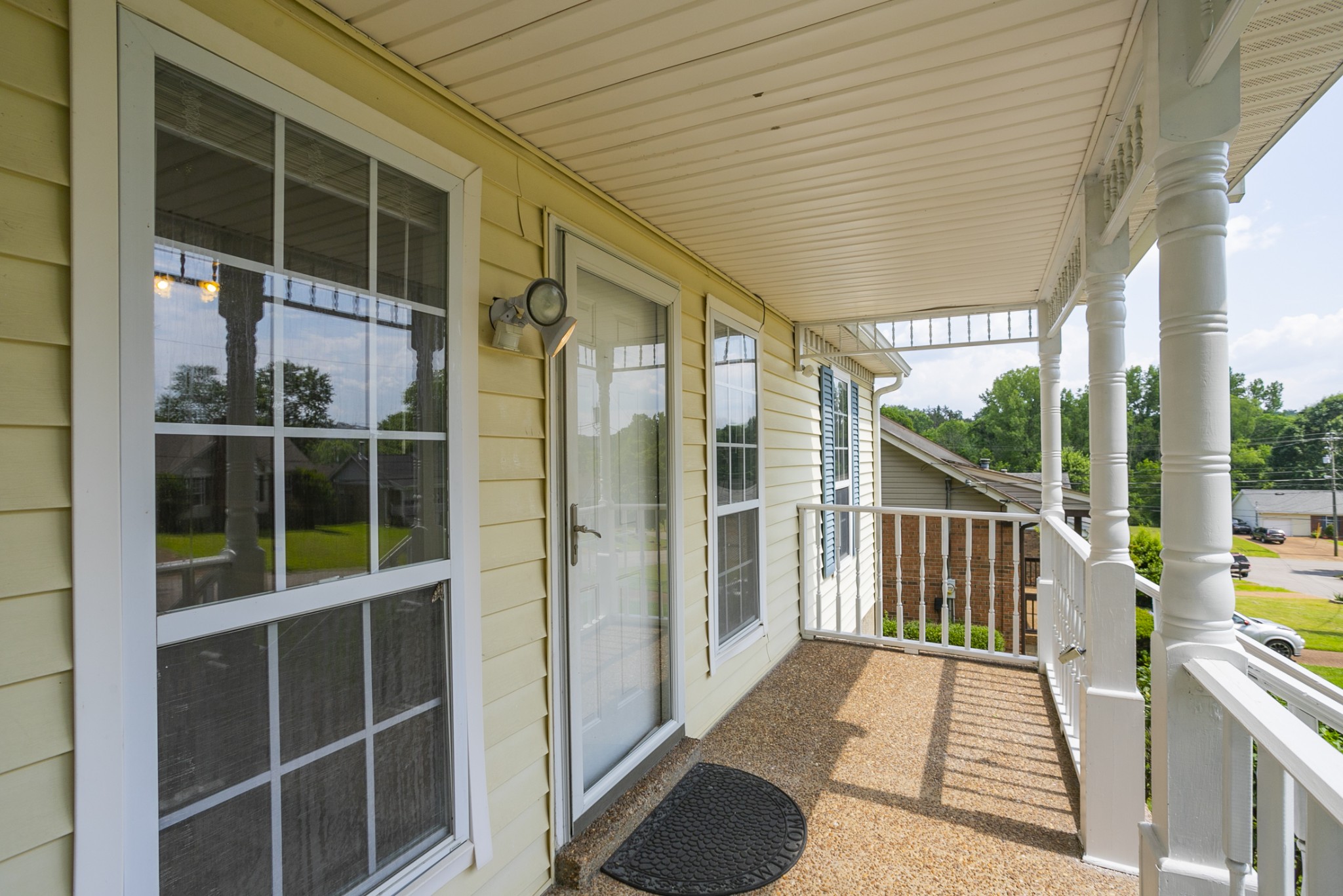 1609 Robards Way Hermitage, TN 37076 - Photo 6 of 43 a view of a balcony with wooden floor and fence