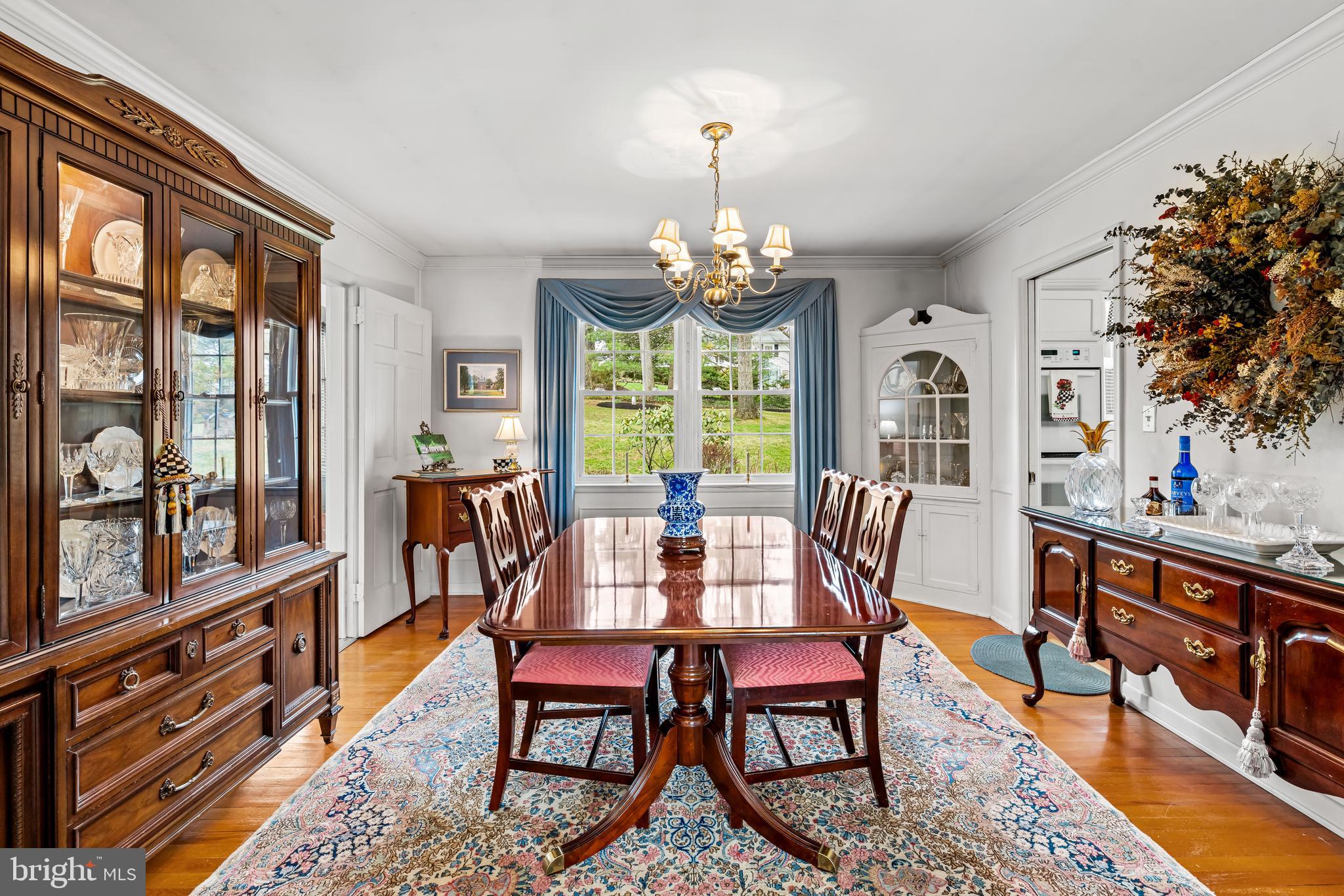 200 Purlington Road Lutherville-Timonium, MD 21093 - Photo 11 of 50 a view of a dining room with furniture a rug and wooden floor