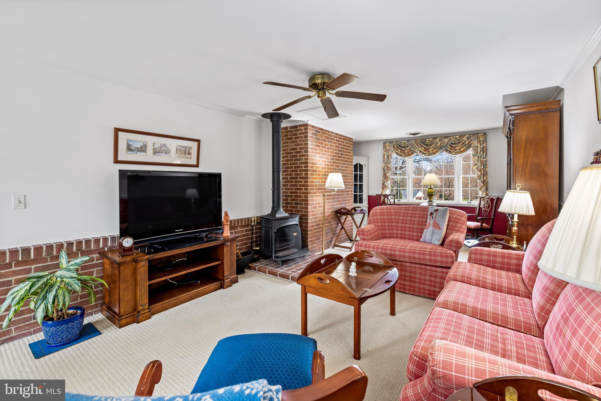200 Purlington Road Lutherville-Timonium, MD 21093 - Photo 14 of 50 a living room with furniture and a flat screen tv