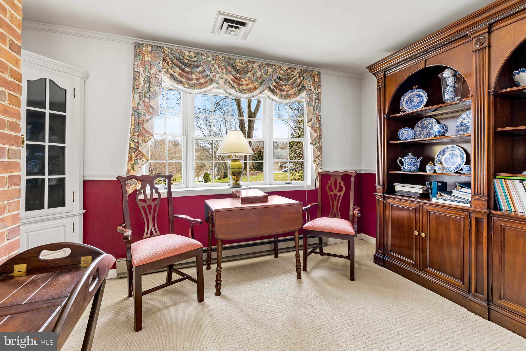 200 Purlington Road Lutherville-Timonium, MD 21093 - Photo 15 of 50 a living room with furniture cabinets and a window